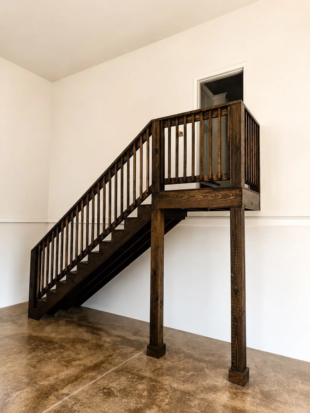 Wooden staircase after a rich dark professional stain finish
